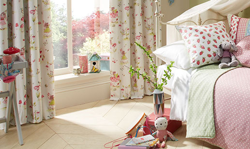 Girl's bedroom with floral curtains