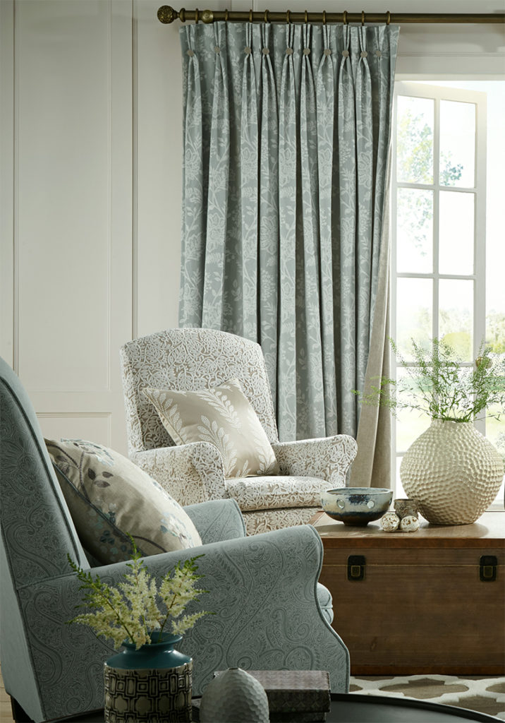 photo showing how to use statement curtain poles in the home 