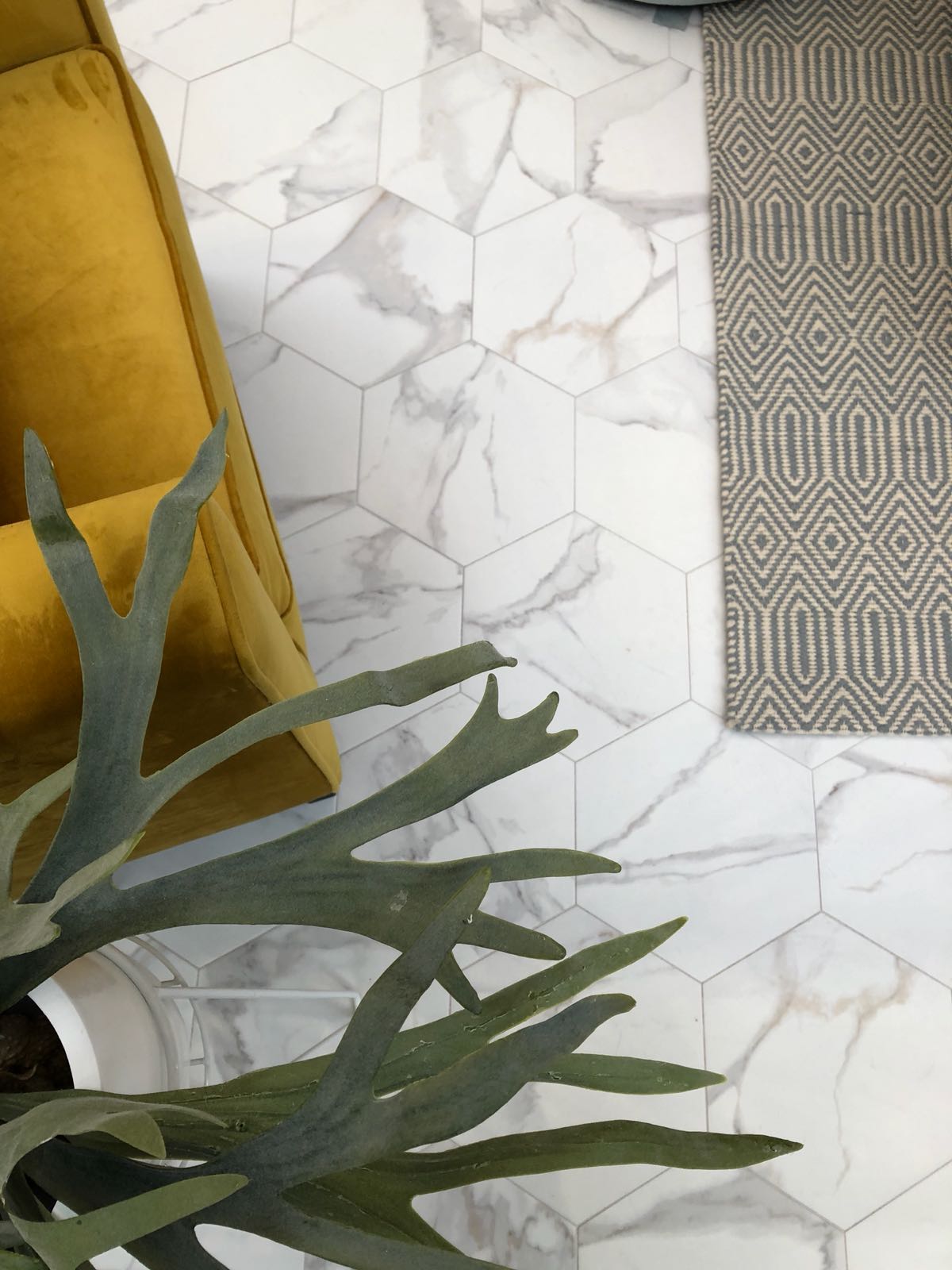 image of marble floor with patterned rug