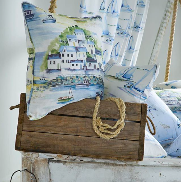 image of nautical printed cushion on table