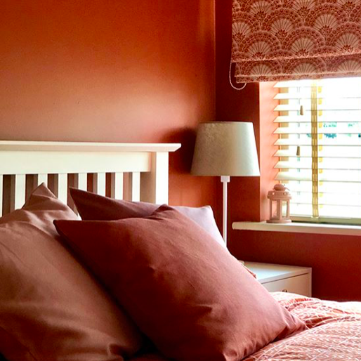 photo of terracotta themed bedroom