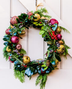 Colourful wreath on door.