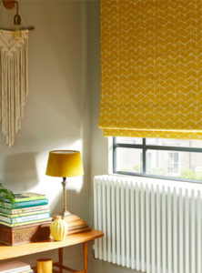example image to show how clean yellow roman blinds look on window