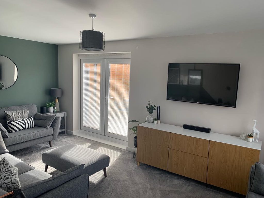 photo of Perfect Fit&reg; Wooden blinds on doors in open planned living room 