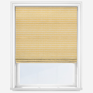 photo of a yellow roller blind with white spots that can be used in a nursery 