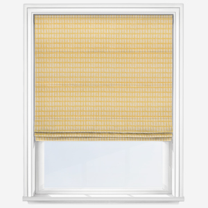 photo of a yellow roller blind with white spots that can be used in a nursery 