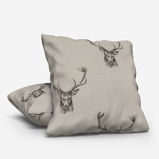 static image of two cushions with stags printed on them 