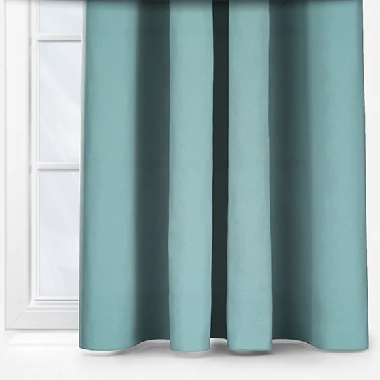 Blue sky curtain touched by design by blinds direct.