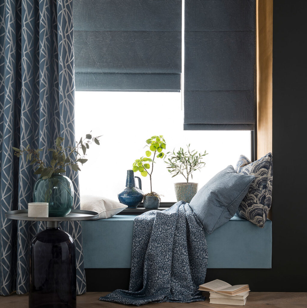 blue positive colours in bedroom and roman blinds