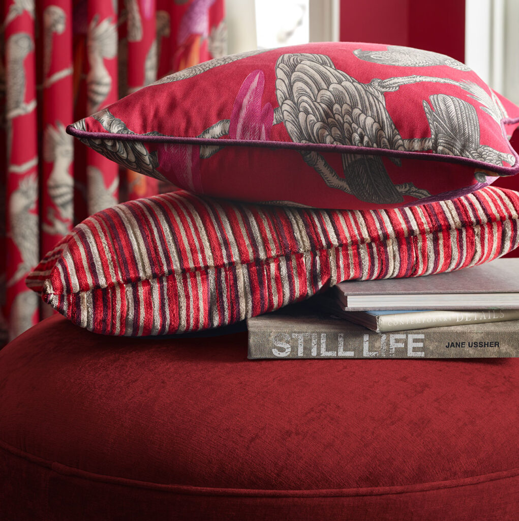 warm red coloured striped cushions 
