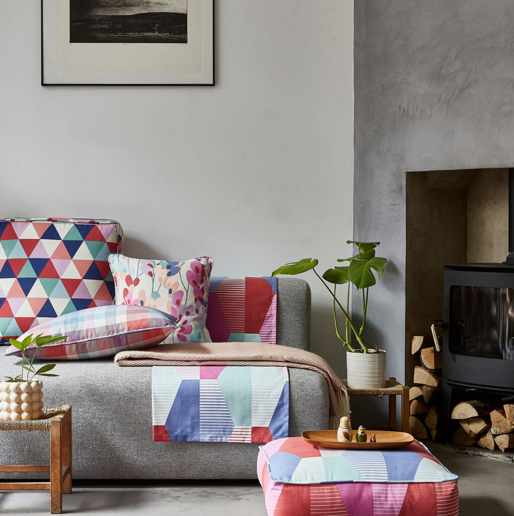 bright coloured fabric used on cushions to show how to get happiness at home