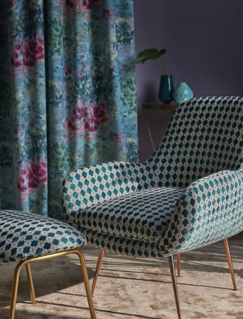 floral curtain and blue chair with foot rest to show design in the swinging sixties on the 20th century timeline