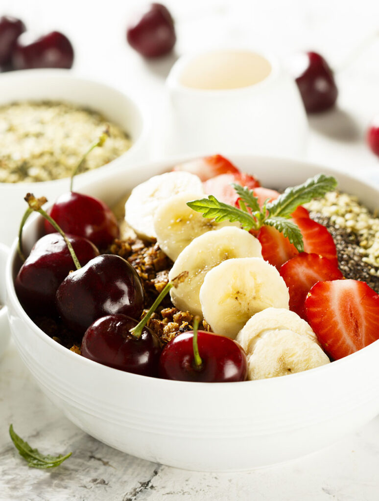 image of bowl of fruit to show how a good diet can improve how well you sleep 