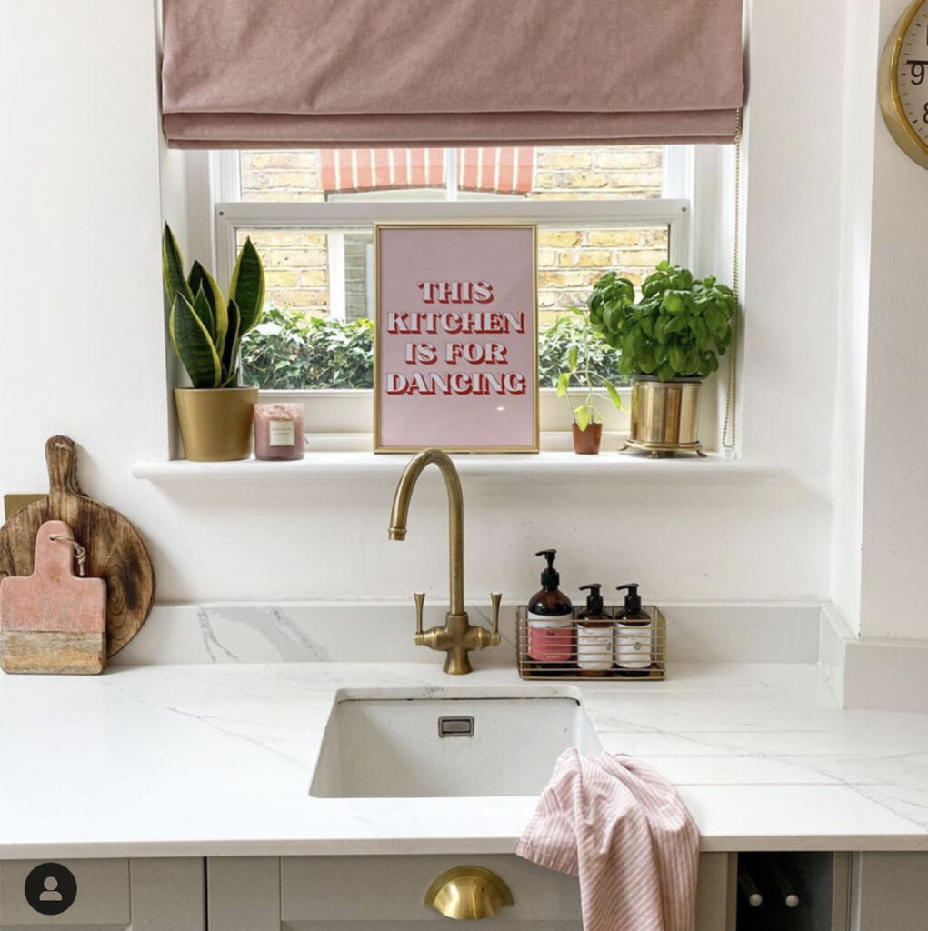 photo of social media post show blinds direct customer using pink roman blinds in their kitchen