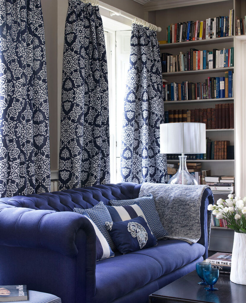 image to show blue themed living room as example of the best way to use the blue and neutral colour combinations