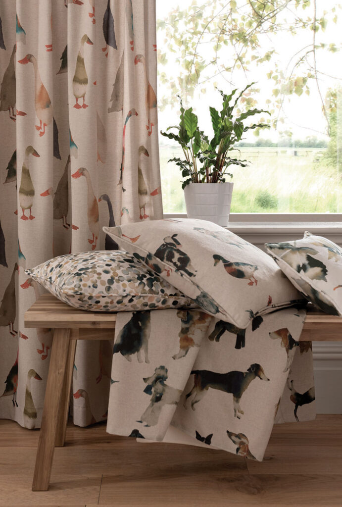 image of animal printed fabrics and cushions perfect for village green decor