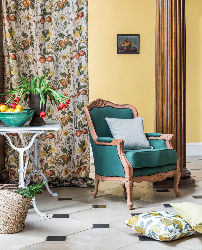 image of green chair next to curtain in a victorian glasshouse