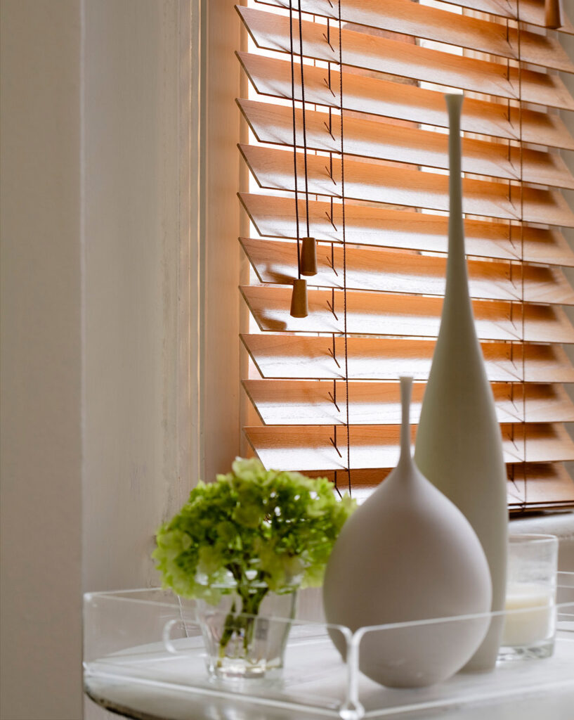 image to show how best to use chunky wooden blinds in the kitchen 