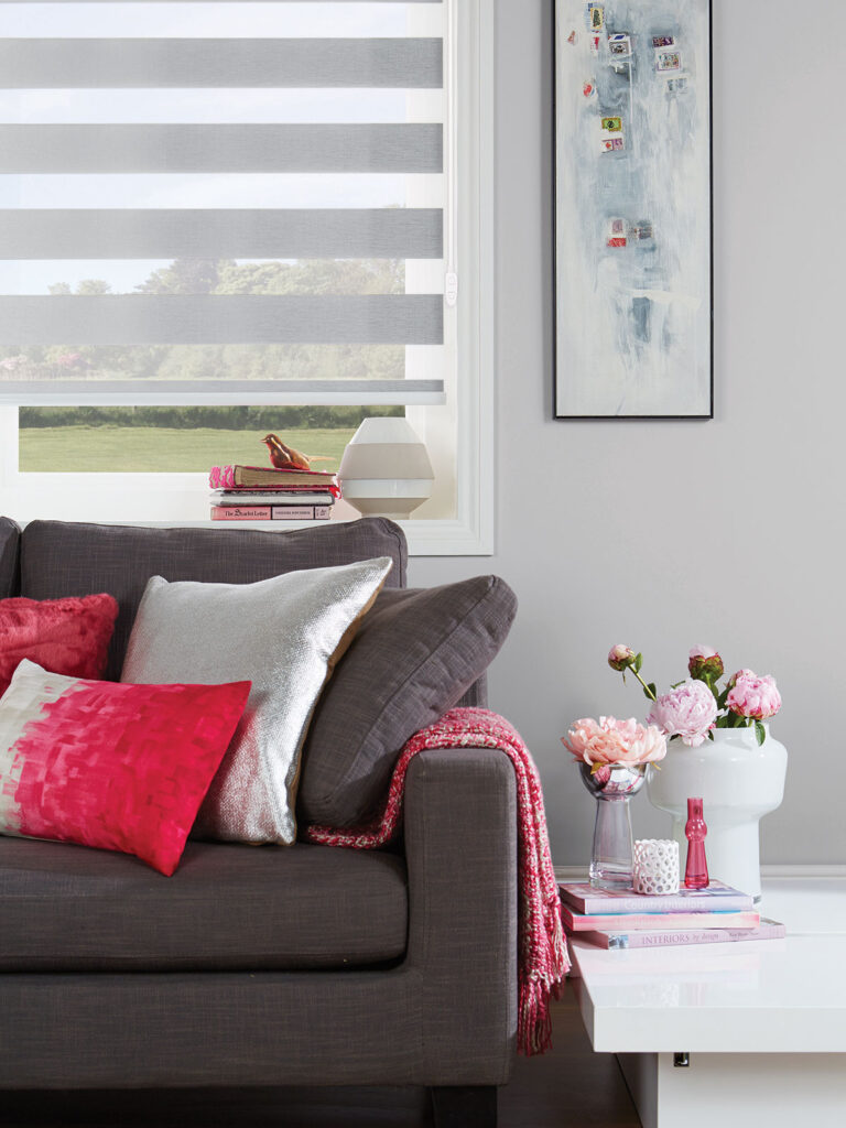image to show day and night blinds being used in a living room 