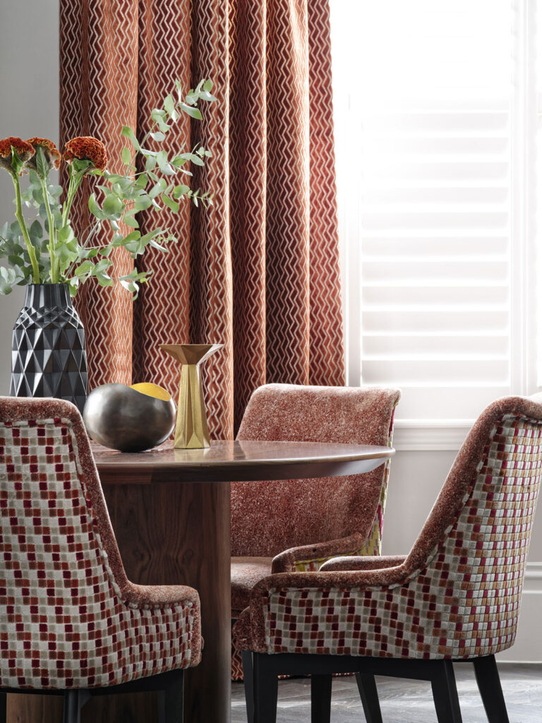 image to show which colours go well with orange in a dining room 