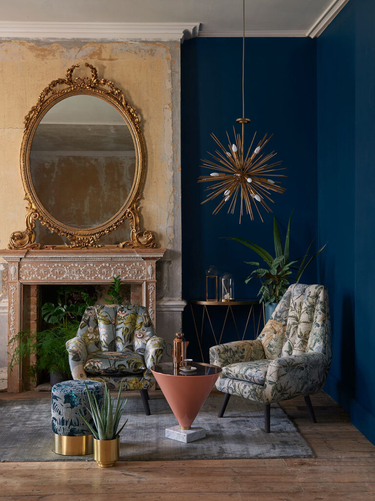 image of living room with blue feature wall and bohemian style decor