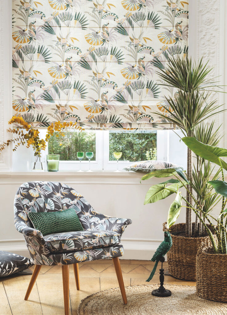 image of brazil inspired floral printed chair and curtain next to window how large house plants