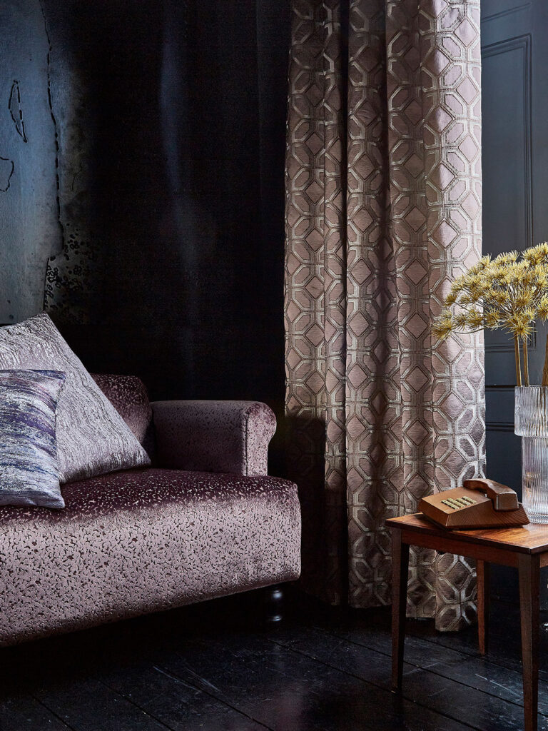 image of living room layout using a black colour theme for interior style