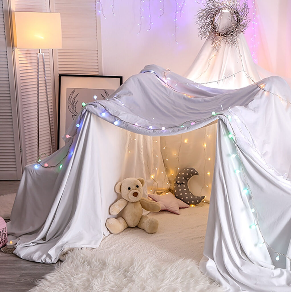 image of curtains that have been repurposed to make a den
