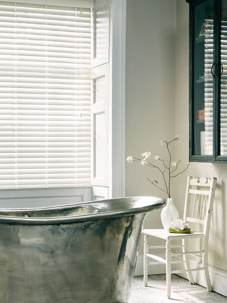 a photo of hygienic blinds being used in bathroom
