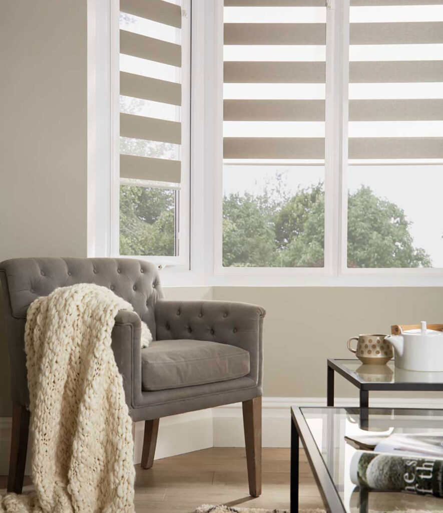 photo of a bay window in a living room using day and night blinds 