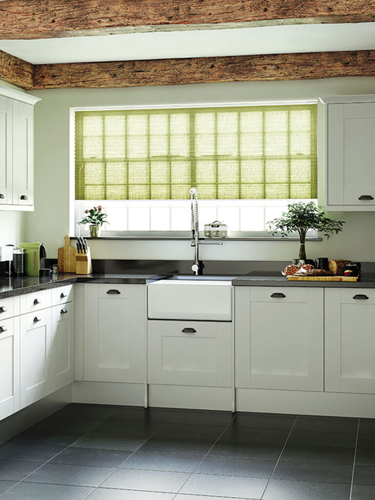 photo of kitchen with a green colour scheme
