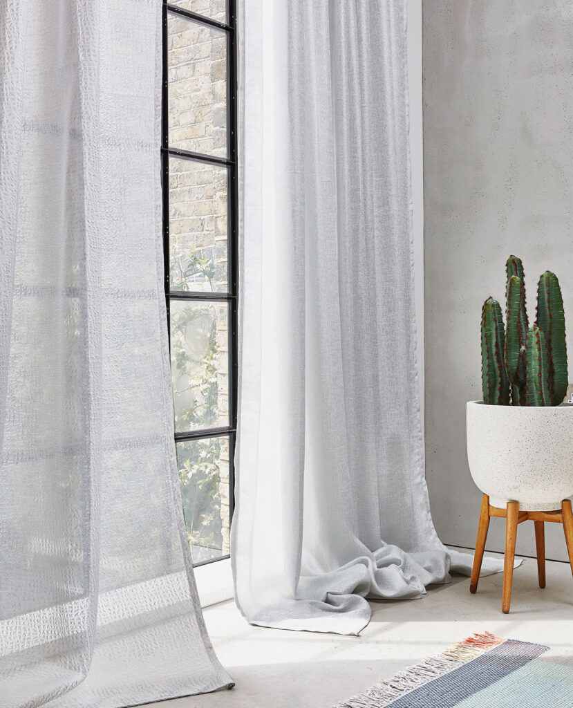 image to show white curtains can be used to compliment a pastel colour palette
