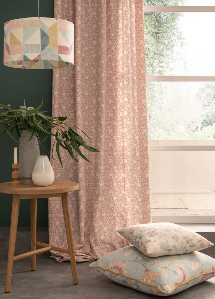 room set image of a pink and green living room 