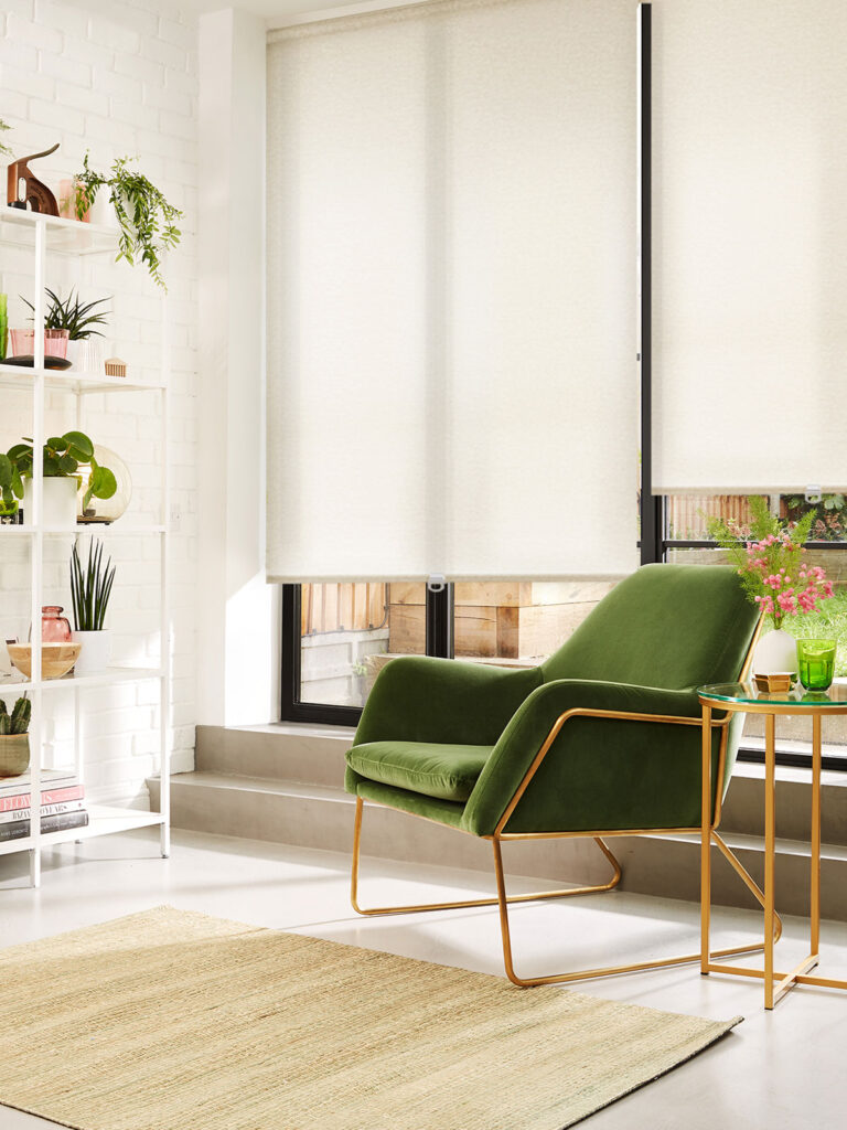 image of green chair in room next to large window with cordless blinds fitted