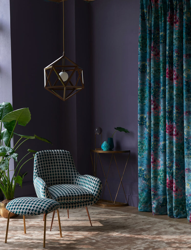 image of living room with royal purple walls and teal curtains 