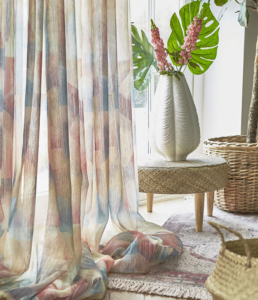 photo to show how voile curtains can cool your house down in the summer 