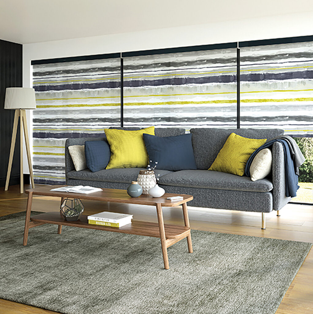 image of a wavy line type curtain in living room with sofa in front 