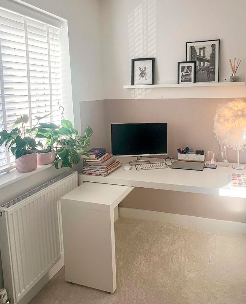 a photo from a blinds direct customer using white wooden blinds in their study