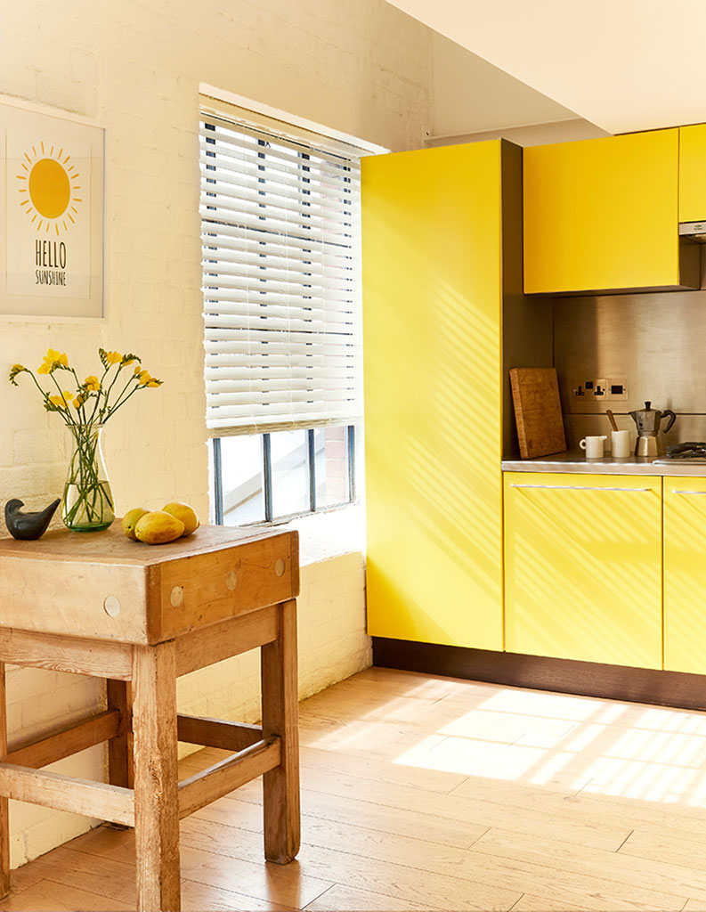 room set image of kitchen using a bright colour scheme 