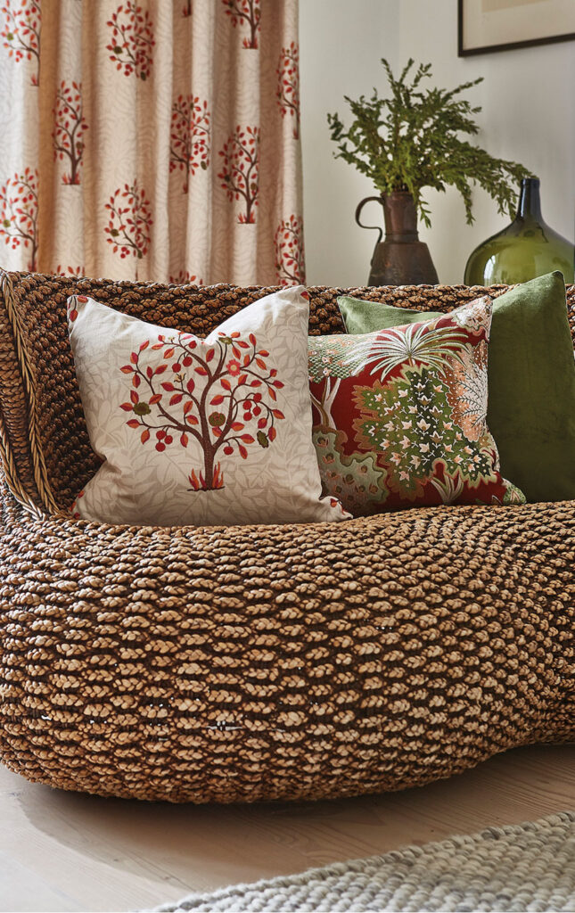 image of cushions on top of wicker chair to show some terracotta home accessories