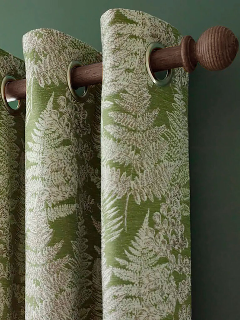 image to show a walnut coloured curtain pole