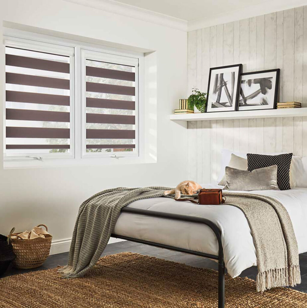 image of cat lying on bed to show that day and night blinds are bet friendly