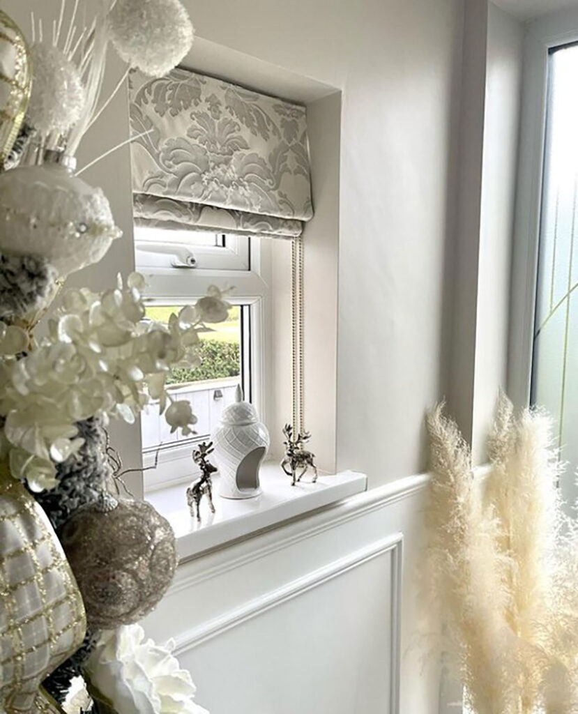 a photo from social media showcasing a customer using blinds direct roman blinds in their hallway 