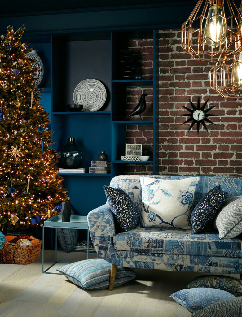 image of bright blue and gold christmas inspired living room 