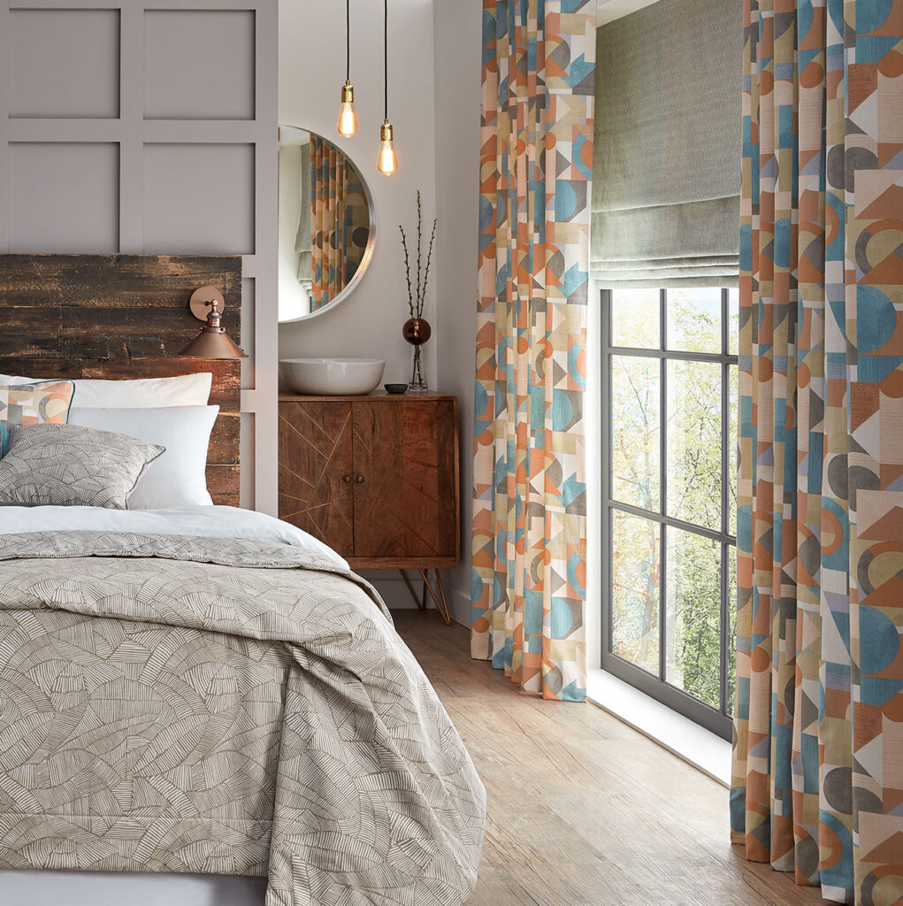 image of window with layered blinds and curtains being used to keep the room warm 