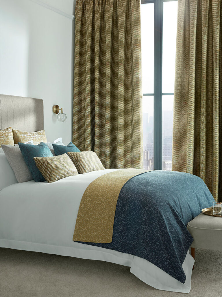 image to show what a bedroom inspired by the teal colour looks like