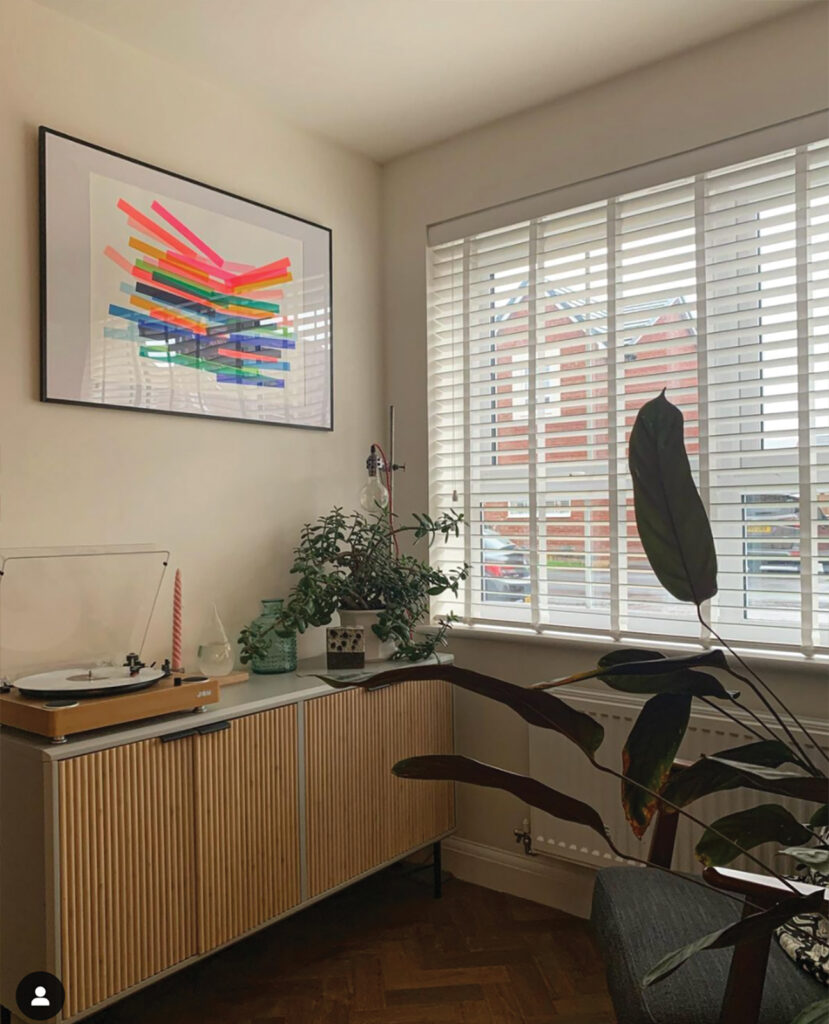 image of room in the house with larger window and storage 