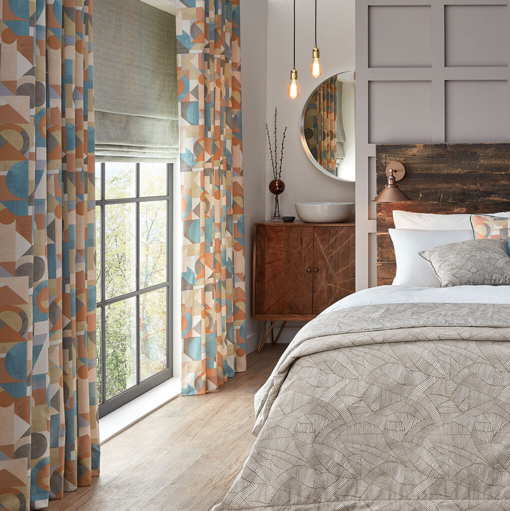 image of a bedroom interiors with colourful curtains