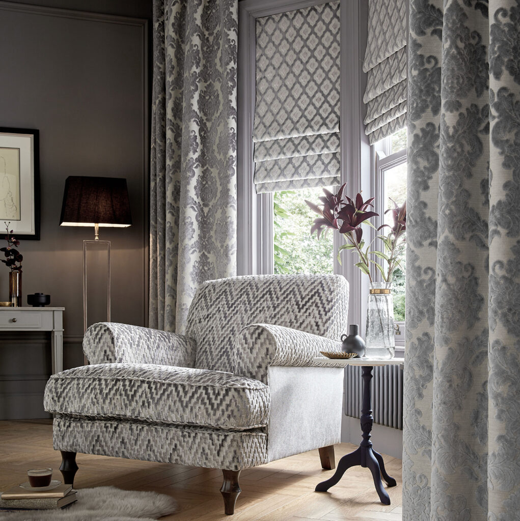 photo to show example of how using curtains and roman blinds as a window dressing can be energy saving