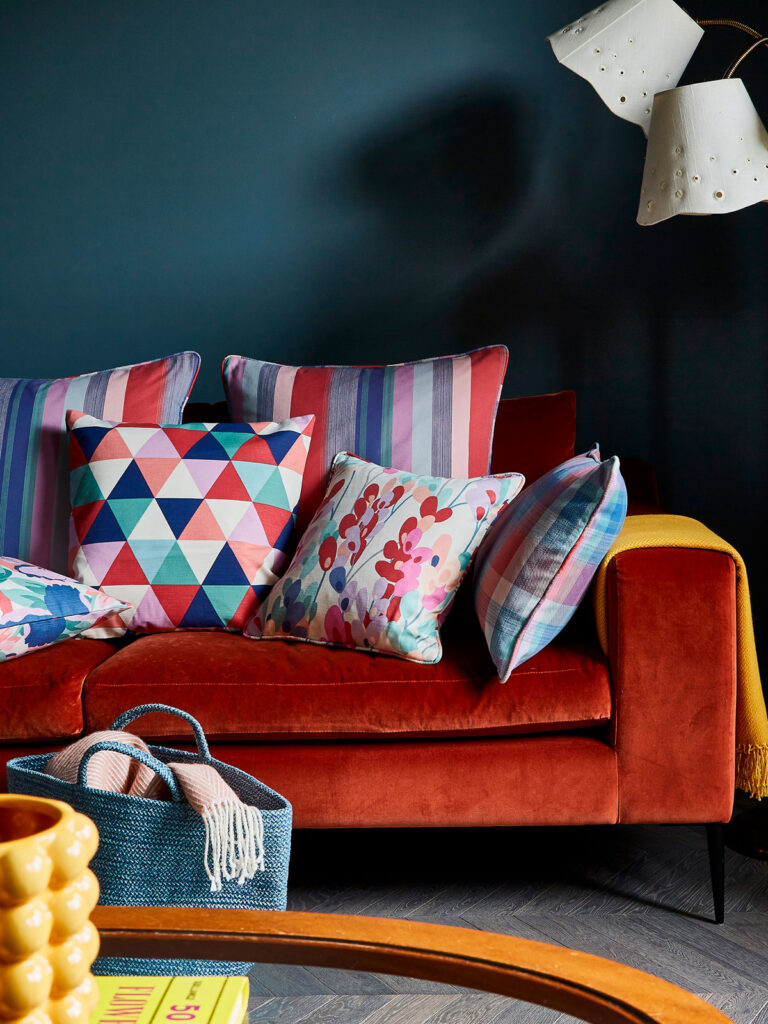 image of cushions on a sofa perfect for cool cocooning